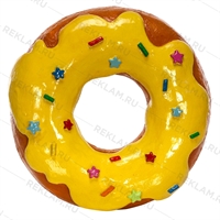 муляж пончика с желтой глазурью