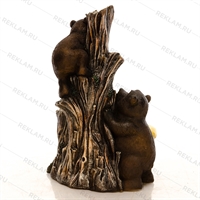 уличный фонтан с медведем