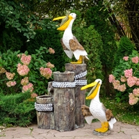 садовые фигуры птиц пеликаны