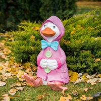 Фигурка утенок в плаще - фото 35121